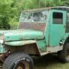 1948 Willys Jeep used to haul trestle timbers back to future Trestle Inn site. Lee doesn't get rid of anything...and it still works!